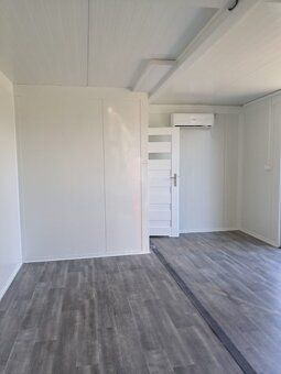 Predám používaný kontajner,rozmer vnútorný 7x4 . Podlaha vin
