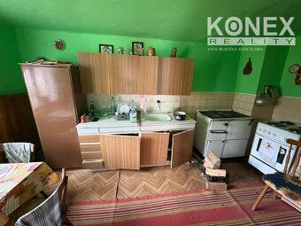 ID:3995 Ponúkame na predaj pozemok s rodinným domom v pokojn