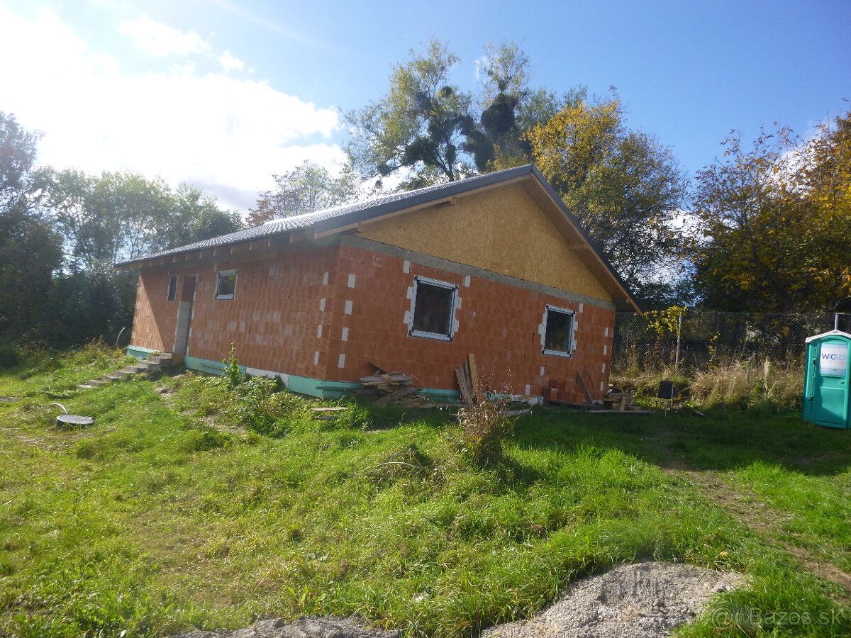 We offer for sale a rough construction of a family house on land in 