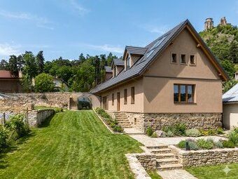 We offer for sale a rough construction of a family house on land in 