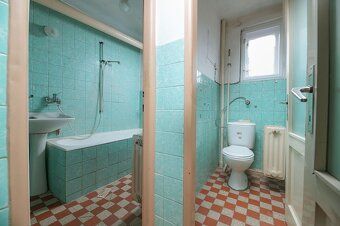 We offer for sale a 7-room two-generation family house with land