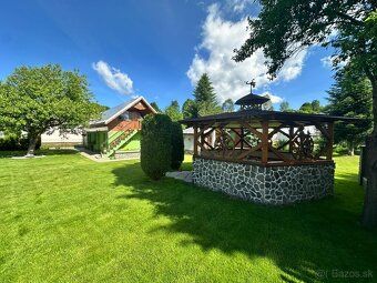 Spacious renovated apartment with balcony and garden view