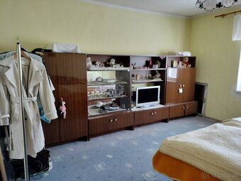 Sell family house in Slovenské Ďarmoty with summer kitchenette and attic.