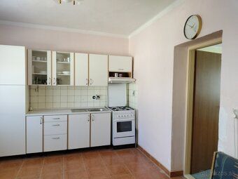 Sell family house in Slovenské Ďarmoty with summer kitchenette and attic.