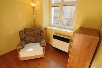 We offer for rent a large 2 bedroom apartment on the 1st floor in the historic city center at Stará Baštová Street.