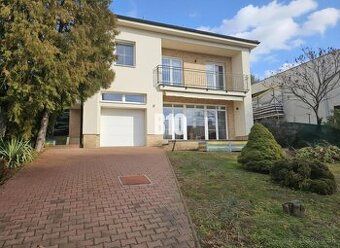 I will exchange an older nice family house of 8 ares in