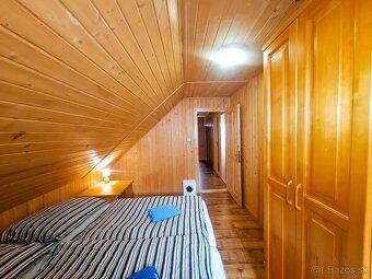 We offer for sale a two-story log cabin built in 2010