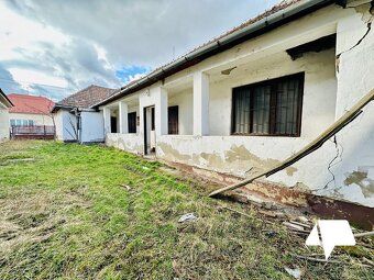 For sale land with an older family house in the city