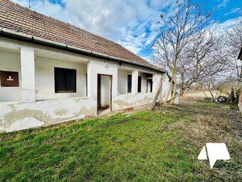 For sale land with an older family house in the city