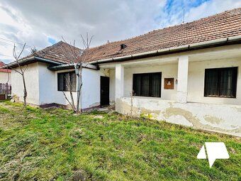 For sale land with an older family house in the city